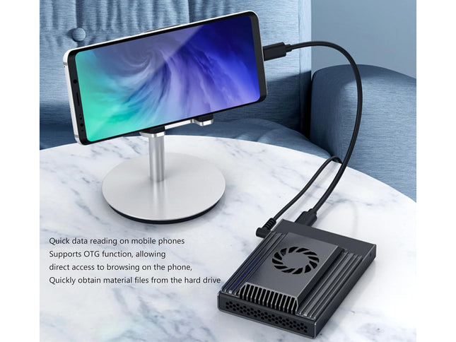 Phone screen magnifier with cooling fan on a marble surface