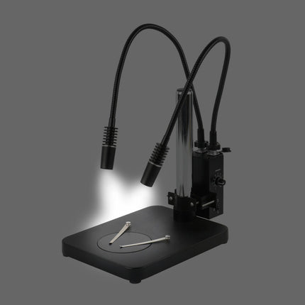 Microscope with dual lamp setup on a gray background