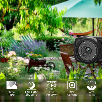 Outdoor garden scene with a camera lens overlay displaying features.