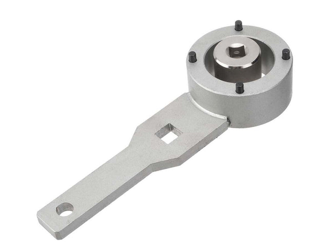 A silver metallic mechanical component with a circular head secured by four black screws and a flat mounting arm with a square cutout, shown on a plain white background.