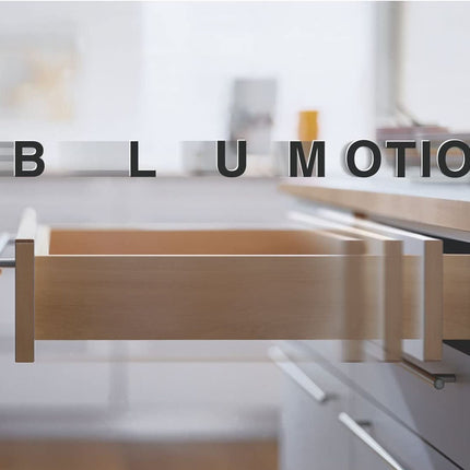 Blumotion drawer opening in a kitchen setting with a blurred background