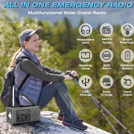 An outdoor promotional graphic for a multifunctional solar crank radio. A woman in a cap and vest sits on a rock in a forest, holding a walkie-talkie, while a portable gray radio with an antenna is shown in the lower left.