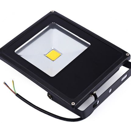 Black LED flood light with visible wiring on a white background