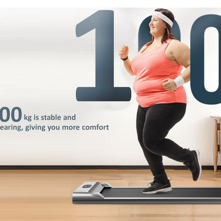 Person using a treadmill with text indicating weight capacity