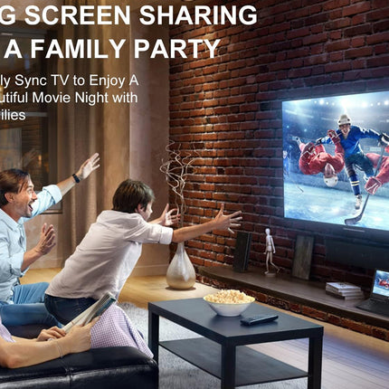 Family watching a hockey game on a large screen TV in a living room.