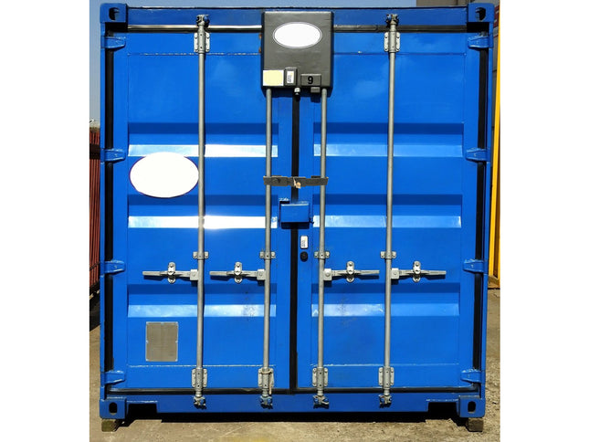 A blue industrial shipping container with double doors, featuring silver metal locking bars, hinges, and a central black electronic lockbox with a circular light.
