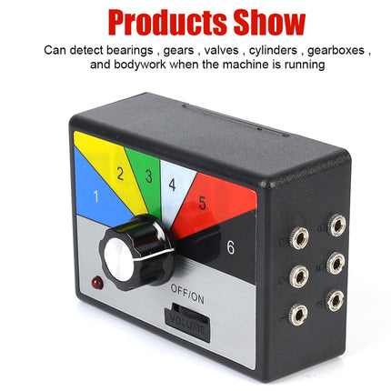 Black device with color-coded indicators and a dial on a white background