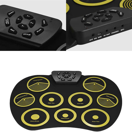 Black electronic drum pad with yellow circles and control buttons on a white background