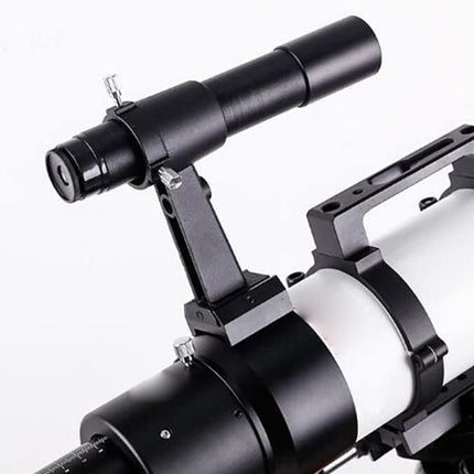 Close-up of a telescope on a white background