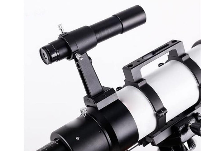 Close-up of a telescope on a white background