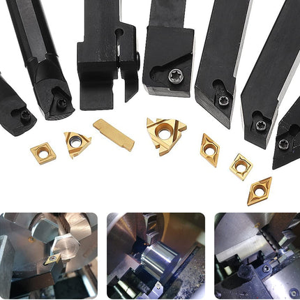 Collection of metal cutting tools and components on a white background