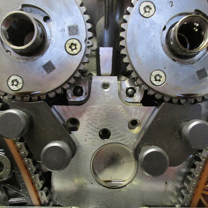 Close-up of mechanical gears and components on a white background