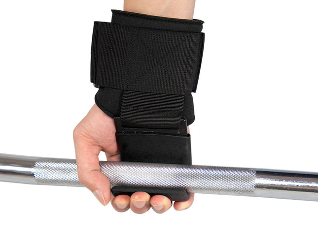 Hand holding a barbell with a black wrist support on a white background