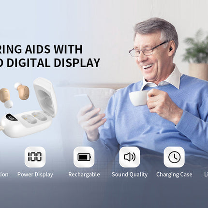 Man using hearing aids with LCD digital display, sitting on a couch with a cup.