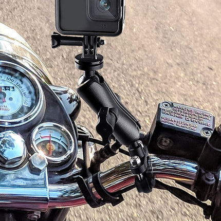 Motorcycle handlebar with a camera mount and visible brand name on a road background