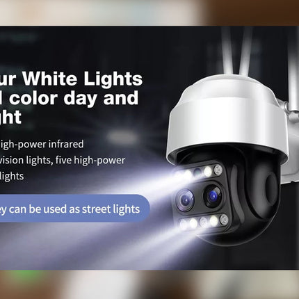 CCTV camera with white lights and text on a blurred background