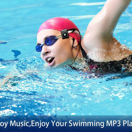 A swimmer in a pool wearing a bright pink swim cap and blue swim goggles, with a small black electronic device attached to the side of the cap. The image includes a text banner at the bottom that reads 'Enjoy Music, Enjoy Your Swimming MP3 Player'.