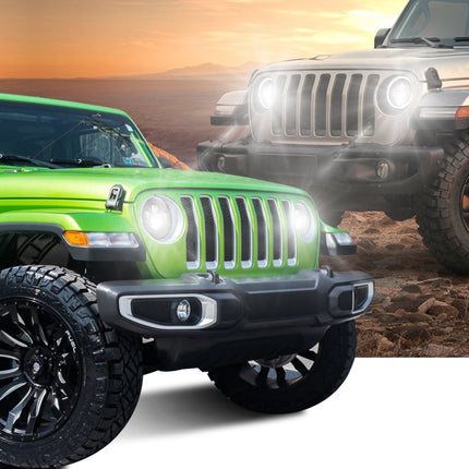 Two Jeeps, one green and one beige, on a desert landscape with a sunset.