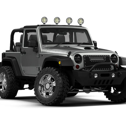 Silver off-road vehicle with large tires and additional lights on a white background