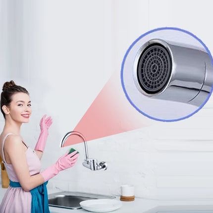 Woman cleaning a kitchen sink with a close-up of a faucet handle.