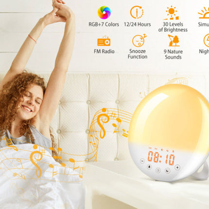 A digital alarm clock with a glowing warm yellow light and an orange LED time display sits on a bed next to a woman stretching in bed. The scene includes feature icons and music note graphics overlaid on the image.