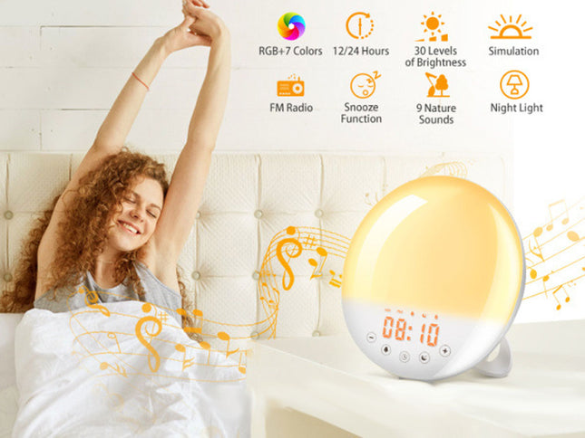 A digital alarm clock with a glowing warm yellow light and an orange LED time display sits on a bed next to a woman stretching in bed. The scene includes feature icons and music note graphics overlaid on the image.