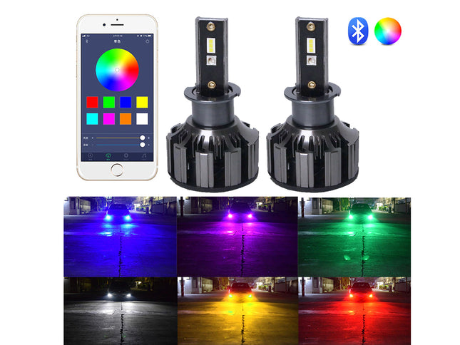 Two black LED car light bulbs shown on a white background, alongside a smartphone app screen displaying a color picker, Bluetooth and Wi-Fi icons, and six nighttime road scene thumbnails showing the light beams in blue, purple, green, yellow, white, and red.