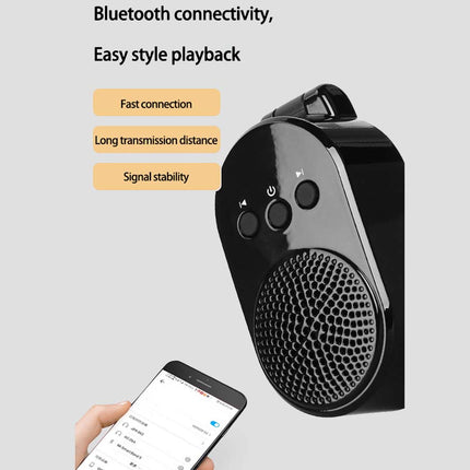 A black portable Bluetooth speaker shown on a light gray background with marketing text about Bluetooth connectivity and a hand holding a smartphone near the speaker.