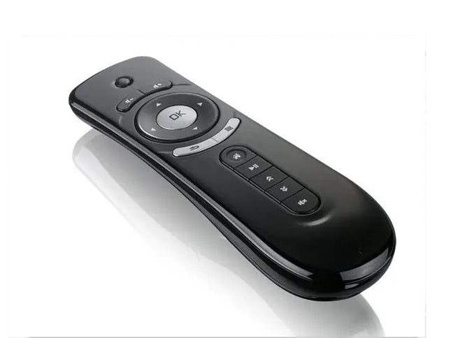 Black remote control on a white background