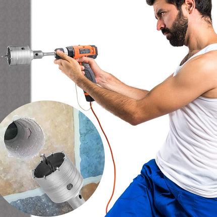 Man using a drill to create a hole in a wall with an inset showing the drill bit.