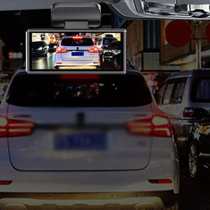Car rearview mirror with a mounted monitor displaying a live feed of the road.