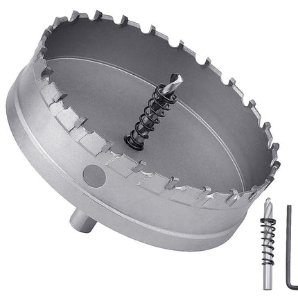 Metal hole saw with drill bit and wrench on a white background