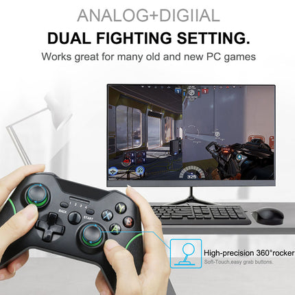 A person's hands holding a black dual analog-digital game controller in front of a computer monitor, keyboard, and mouse. Text at the top reads 'ANALOG+DIGITAL DUAL FIGHTING SETTINGS.