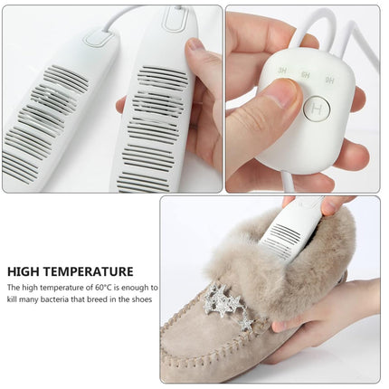 White electronic device with a comb-like attachment, held over a shoe, on a white background.