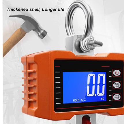 Orange digital weight indicator with a blue screen and a hammer in the background