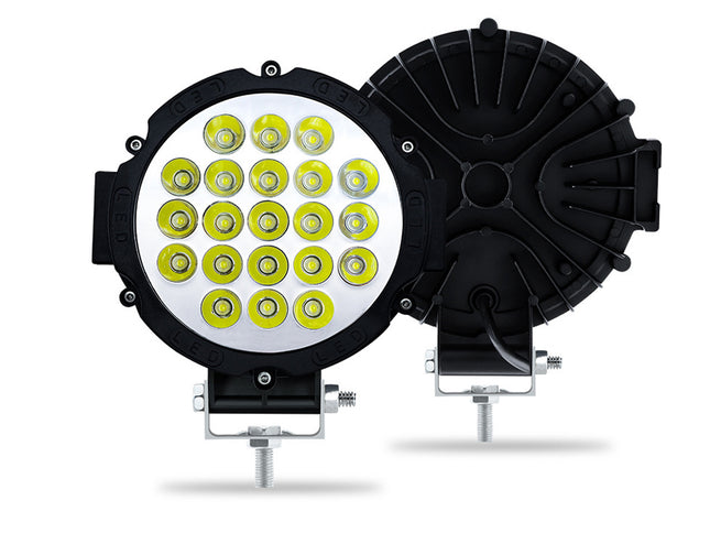 Round LED work light with multiple yellow lights on a white background