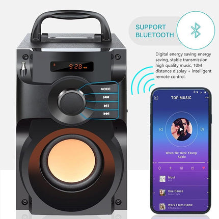 Black Bluetooth speaker with smartphone displaying music app on a white background
