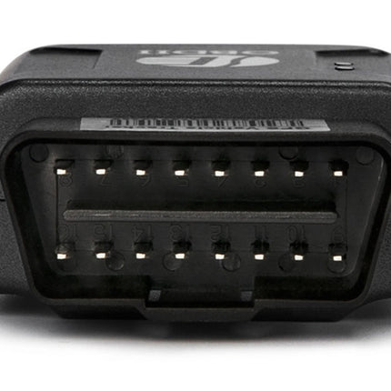 A black OBD2 diagnostic connector plug with 16 pins, showing the internal pin layout and a small white printed logo on the top surface, set against a plain white background.