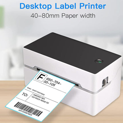 Desktop label printer with a printed label on a wooden surface