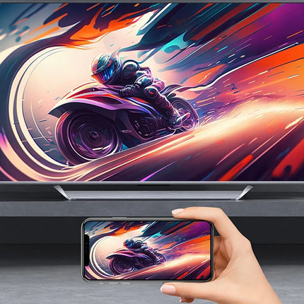 Hand holding a smartphone displaying a colorful motorcycle graphic, with a TV in the background showing the same design.