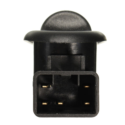 Black plastic component on a white background