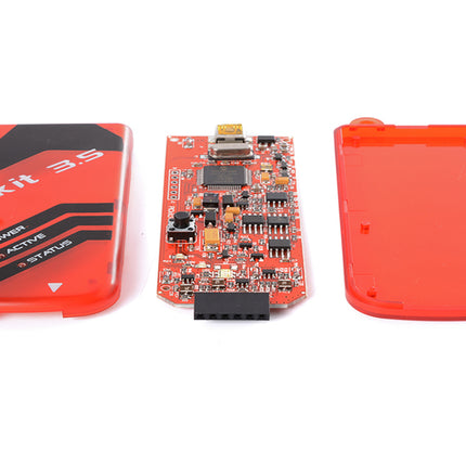A red electronic kit with three components shown on a white background: a branded red cover on the left reading 'kit 3.3', a central circuit board with electronic components, and a matching red cover on the right.