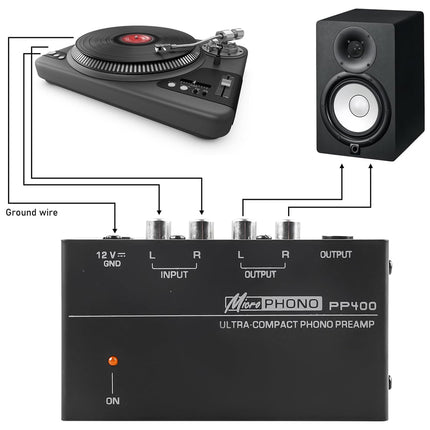 Ultra-compact phono preamp with turntable and speaker diagram on a white background