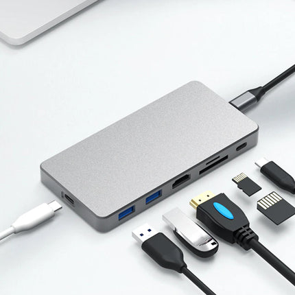 USB hub with multiple cables on a light gray background