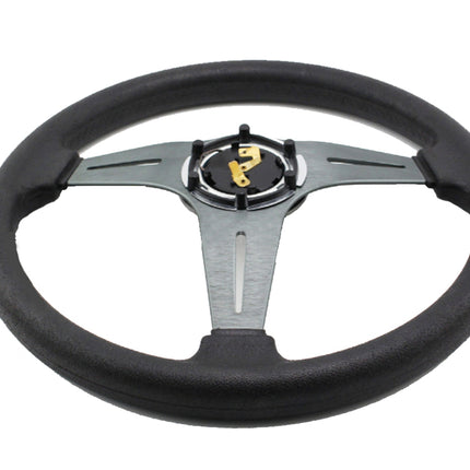 Black steering wheel with a central logo on a white background