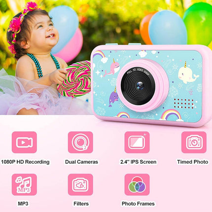 A pink and light blue children's digital camera with unicorn and rainbow graphics, shown alongside a photo of a young girl holding a lollipop. Below the photo are feature icons for 1080P HD recording, dual cameras, a 2.
