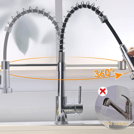 A high-arc stainless steel kitchen faucet with two flexible sprayer arms, shown installed above a sink. One arm is extended outward, and a hand is holding the pull-out head to demonstrate range of motion.
