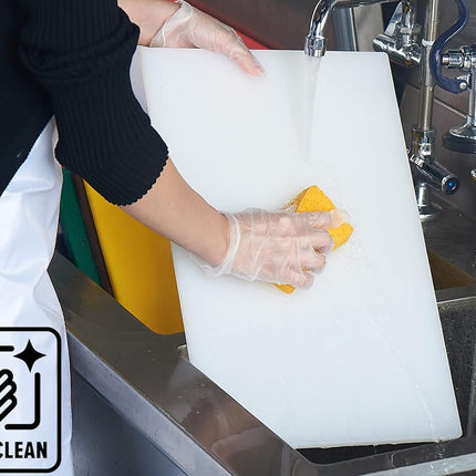 Person cleaning a white cutting board with a yellow sponge in a kitchen sink, with 'EASY CLEAN' icon visible.