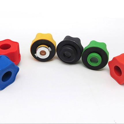 Set of colorful plastic knobs on a white background