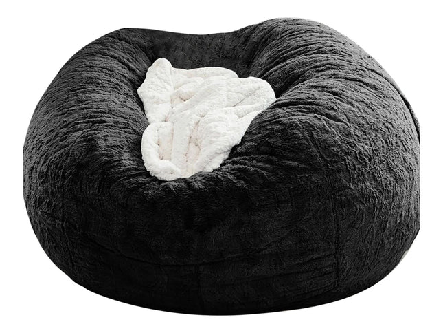 Black fuzzy bean bag chair with a white pillow inside on a white background